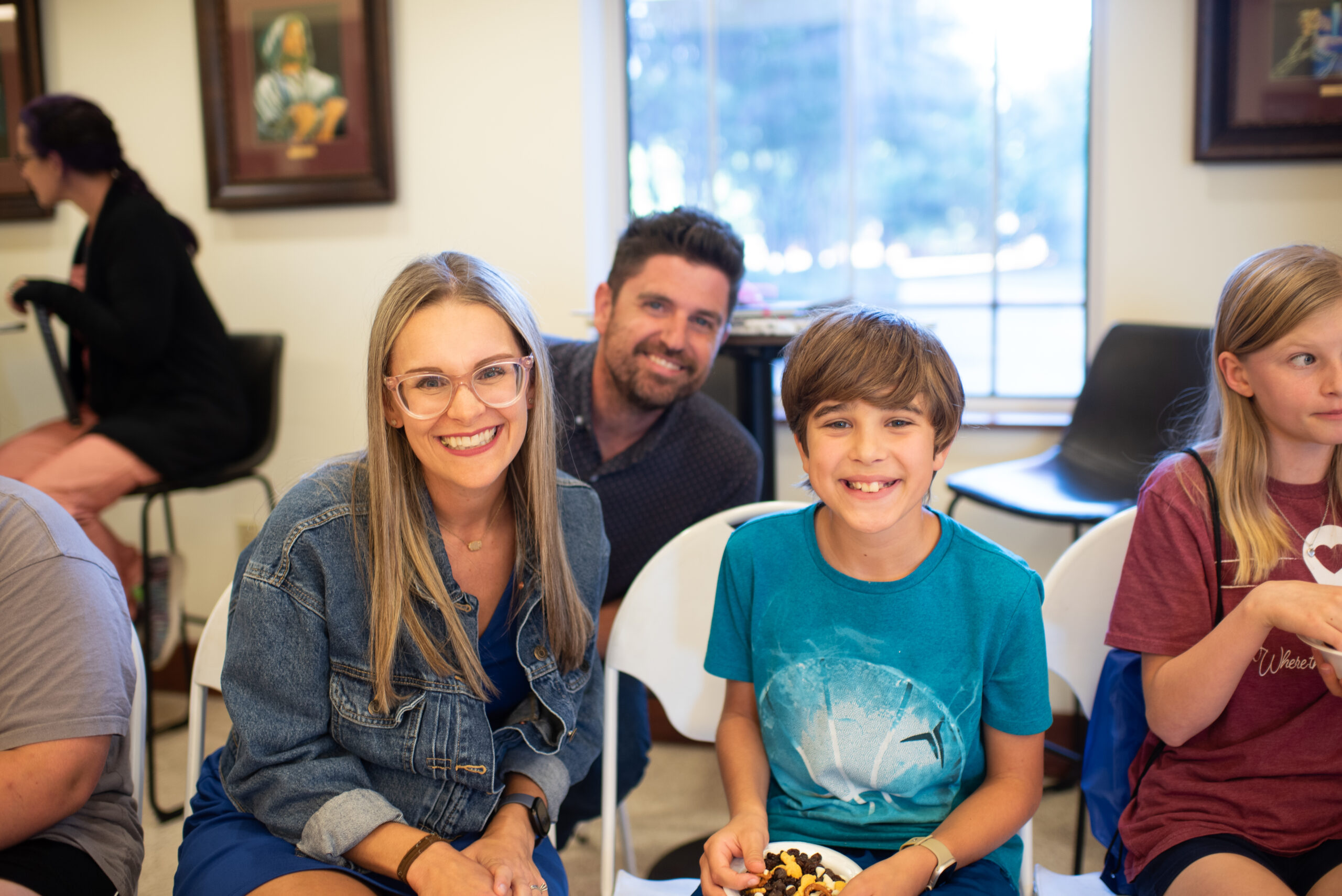 Plan a Visit Holy Trinity three men and laughing two women walking side by side