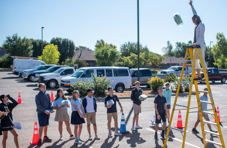 selective focal photo of crayons in yellow box