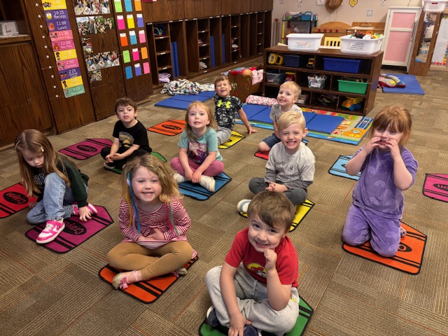 selective focal photo of crayons in yellow box