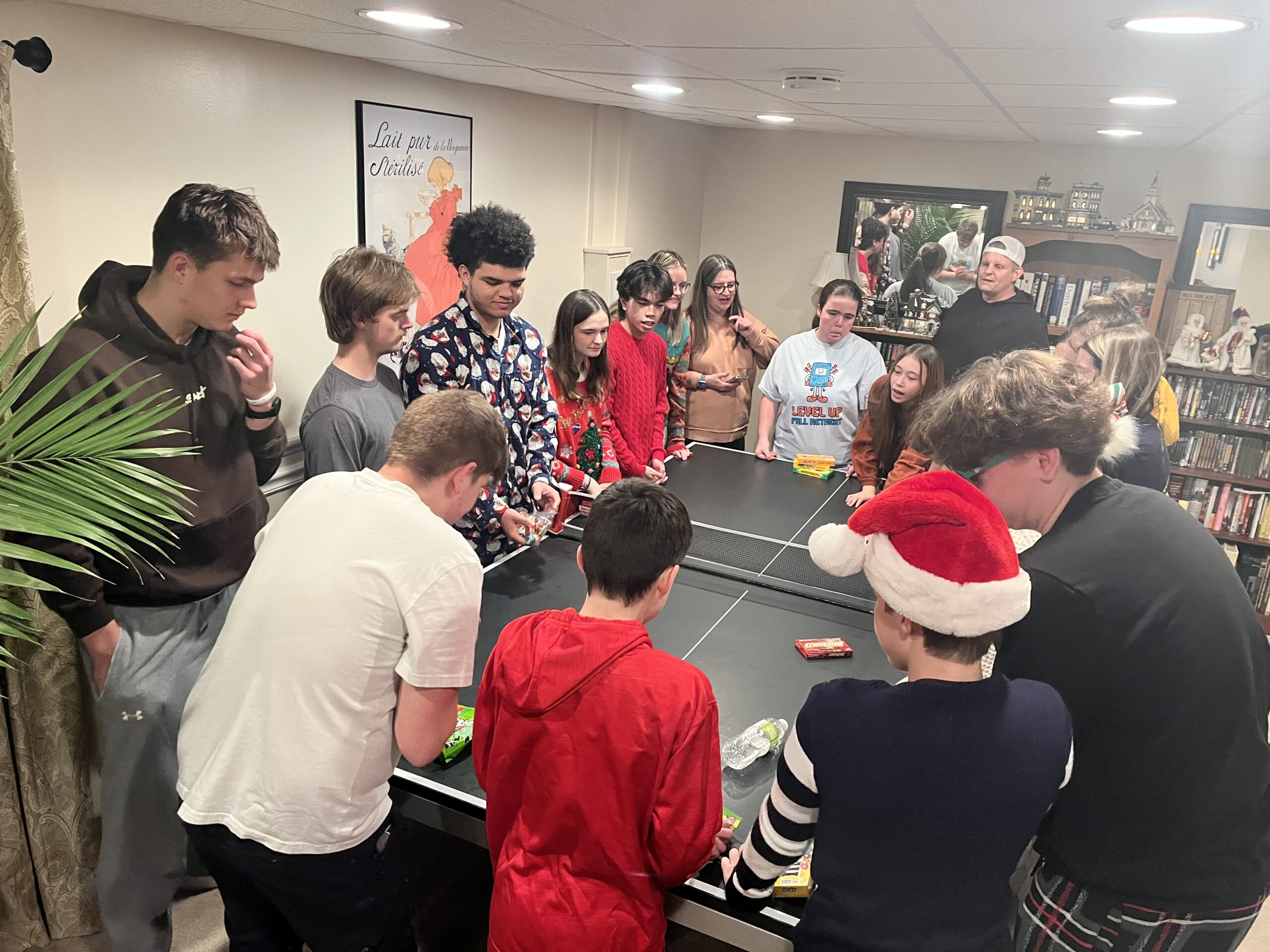 three men and laughing two women walking side by side